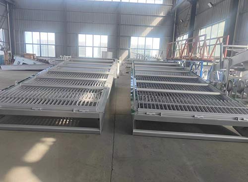 What materials are used for the water treatment grille?
