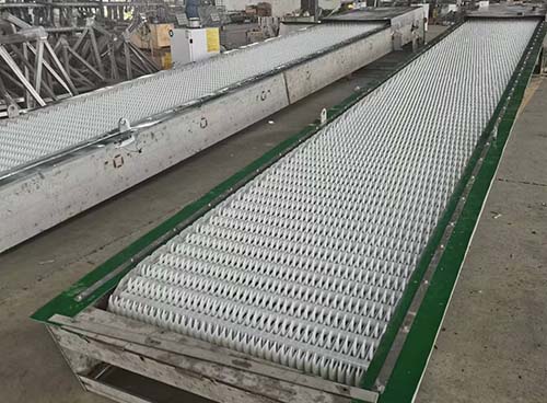 Why are strainers or screens used in the primary treatment of sewage？